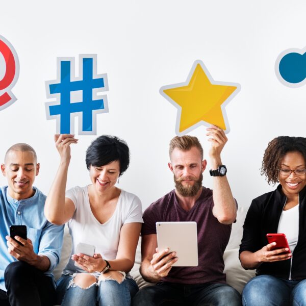 People holding an social media icon
